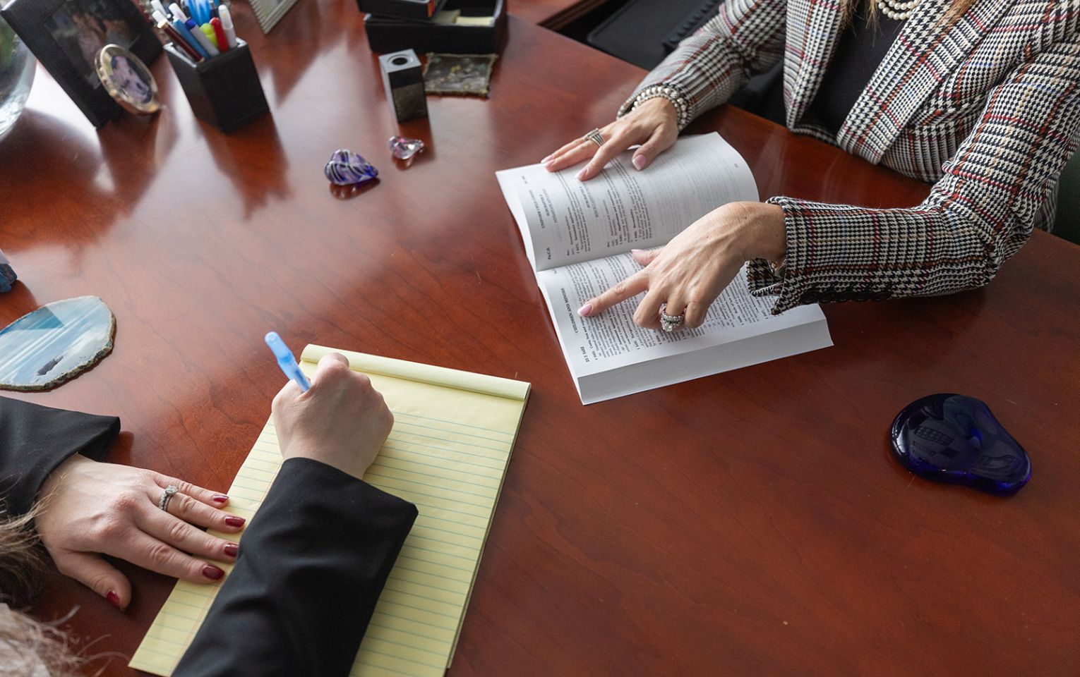 mug of pens on desk | parenting coordination | Feinman & Childs Family Law